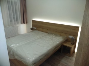 Postele